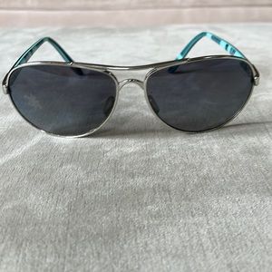 Women’s Aviator Oakley Sunglasses.